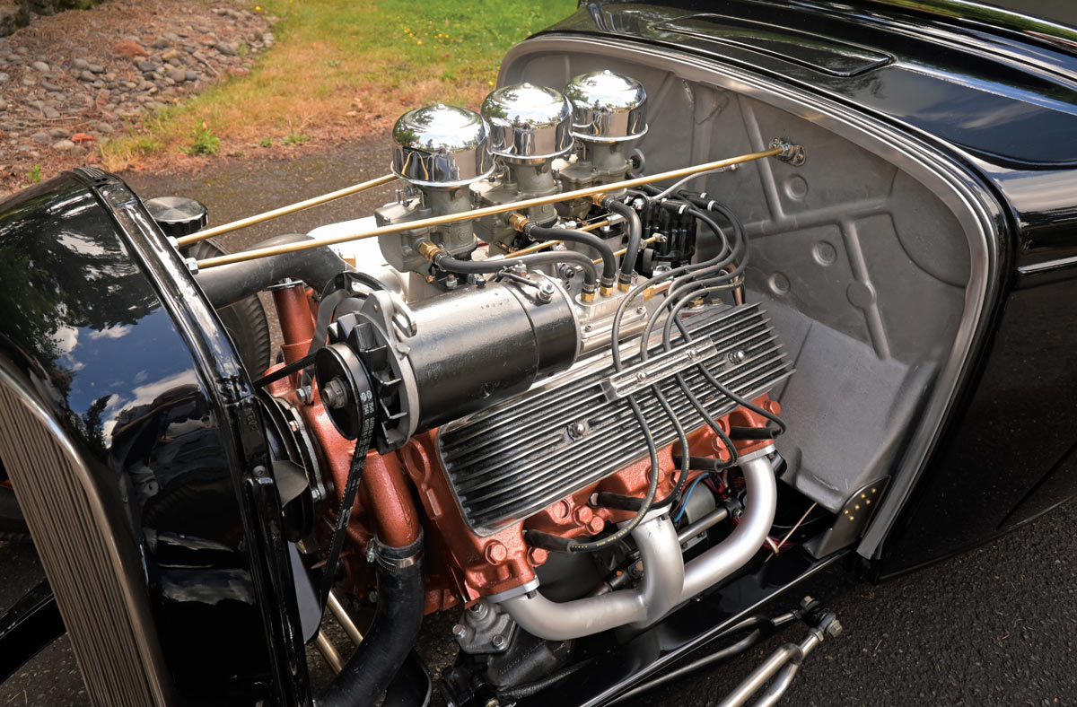 1932 Ford Coupe flathead V8 with triple Stromberg carburetors polished air cleaners detailed fuel and ignition system