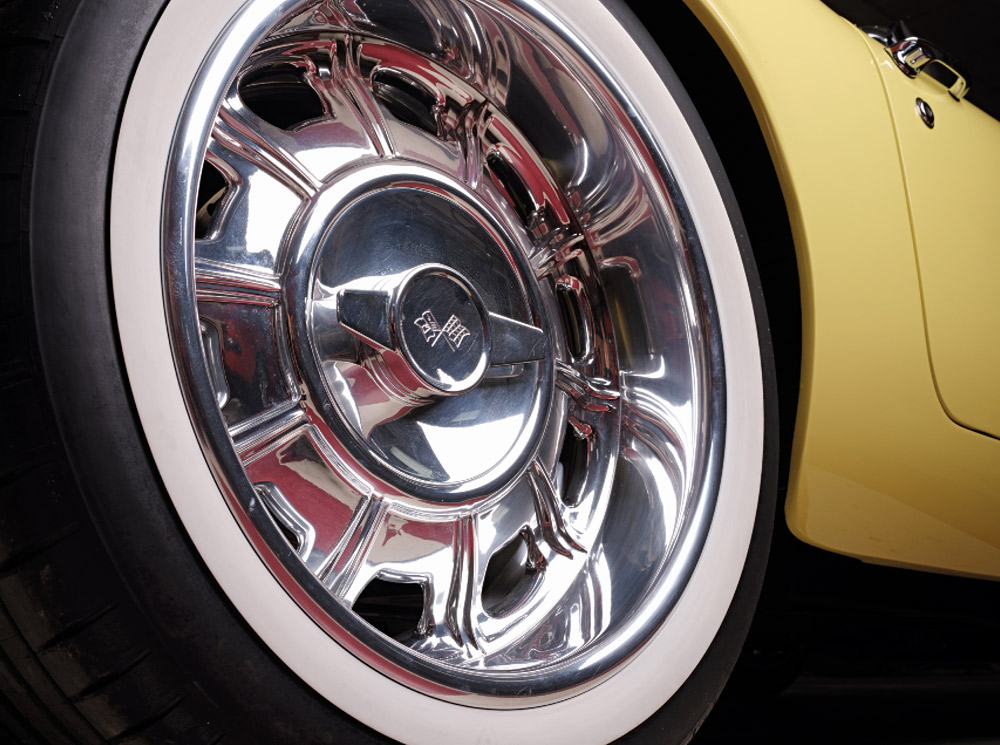 Close-up 1961 Corvette chrome wheel whitewall tire vintage-modern styling