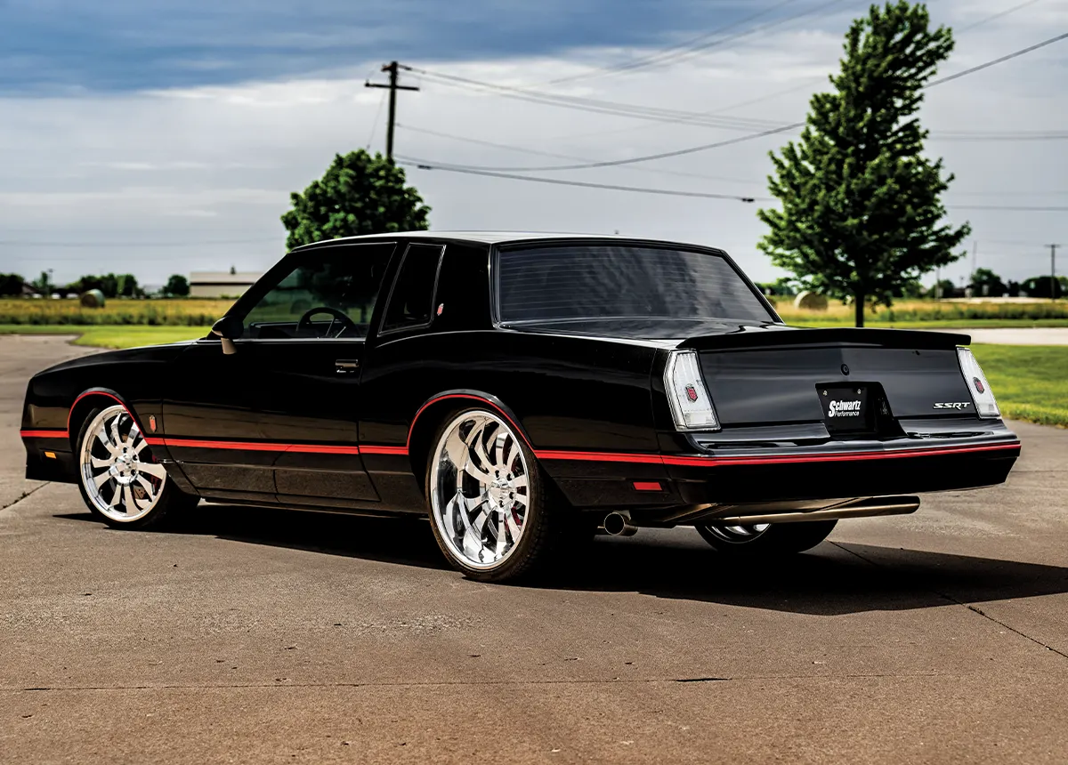 1985 Chevy Monte Carlo custom design black exterior chrome wheels polished finish red accents
