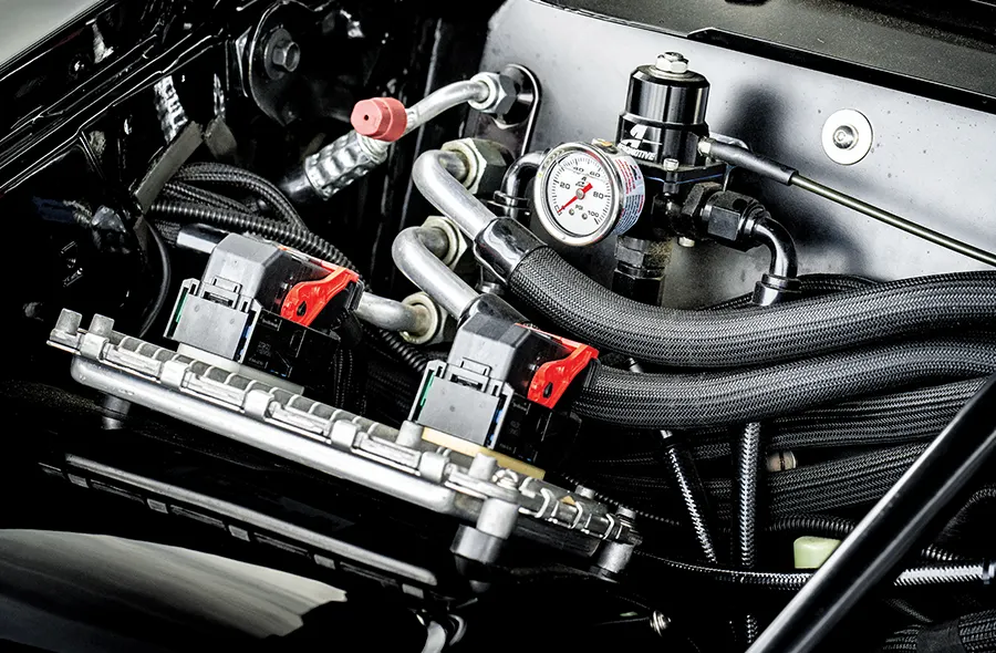 Close-up of supercharger 1985 Chevy Monte Carlo custom engine chrome detailing performance parts