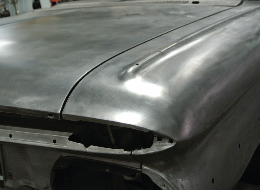 restored 1959 Impala fender with smooth, clean metalwork, ready for finishing