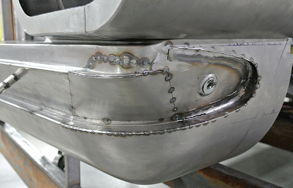 detailed welding on a lower valance corner for a custom 1959 Chevy Impala bumper