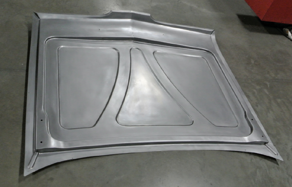 custom fabricated hood panel for a 1959 Chevy Impala featuring reinforced channels and precision shaping