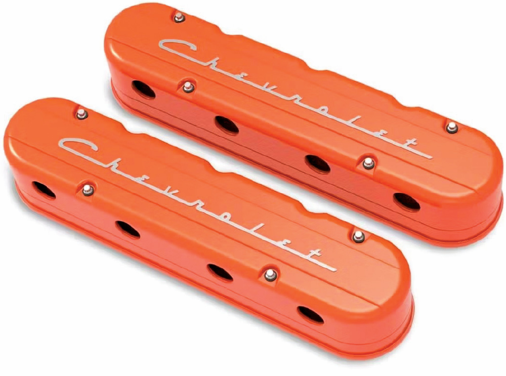Chevrolet orange valve covers with script logo, adding a vintage factory appearance to small block engines