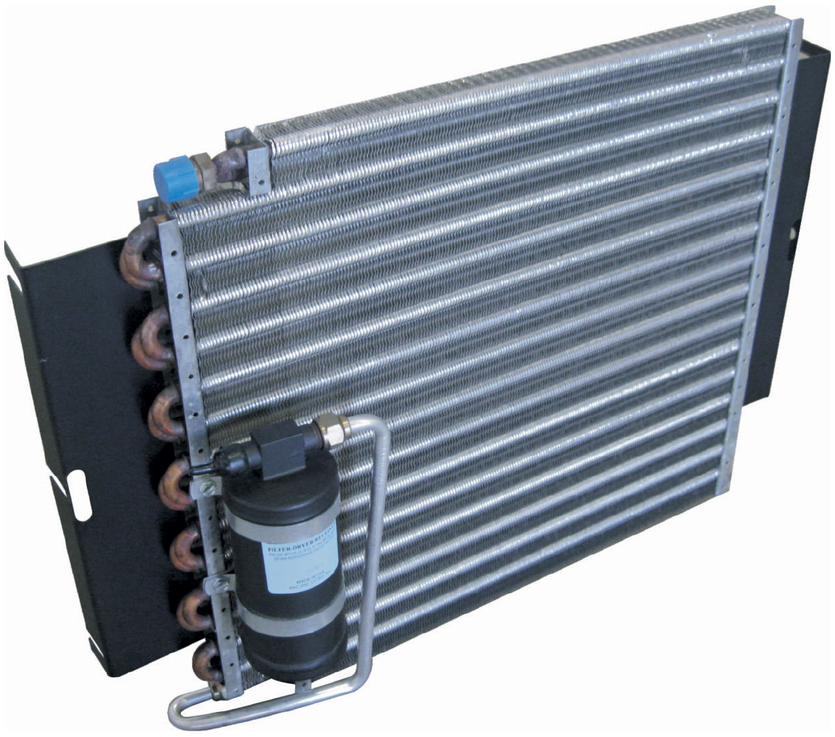 Classic car evaporator core with aluminum tubing and a receiver drier mounted on the side for air conditioning