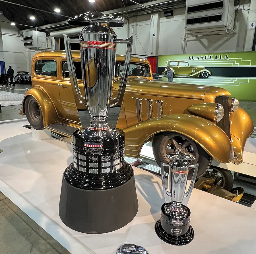 Beautifully restored 1933 Chevrolet coupe, displayed with the prestigious Al Slonaker Memorial Award trophies