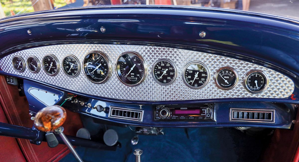 1932 Ford Tudor dashboard featuring engine-turned aluminum with vintage-style gauges