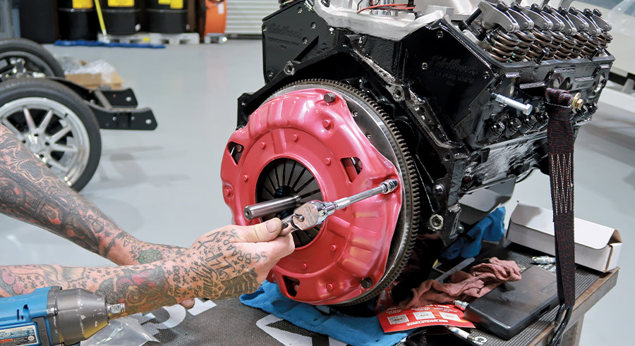 RAM pressure plate being installed by tightening it in a circular pattern and torquing to the recommended specs