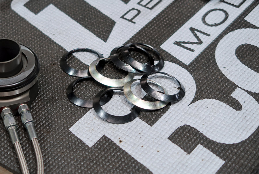 close up of shims from the Summit Pro Pak clutch kit on a mat