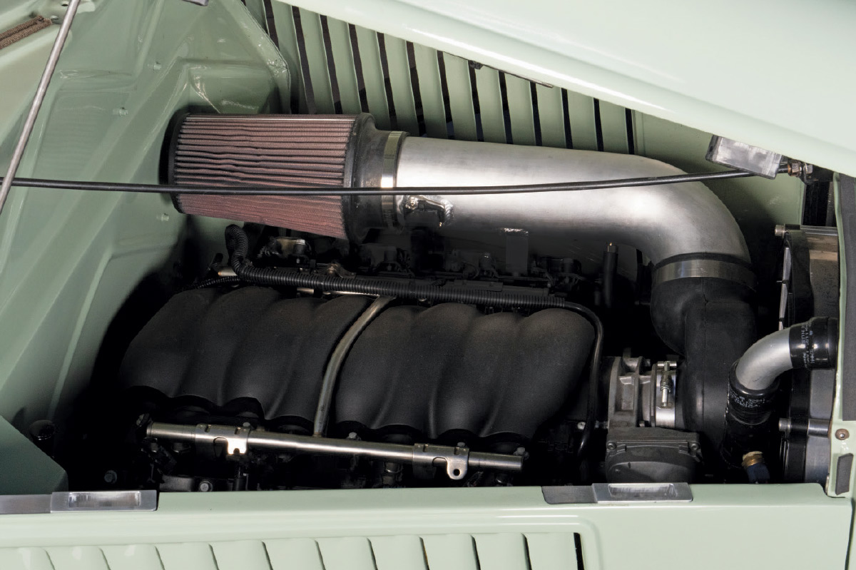 engine of sage green 1936 ford pickup truck