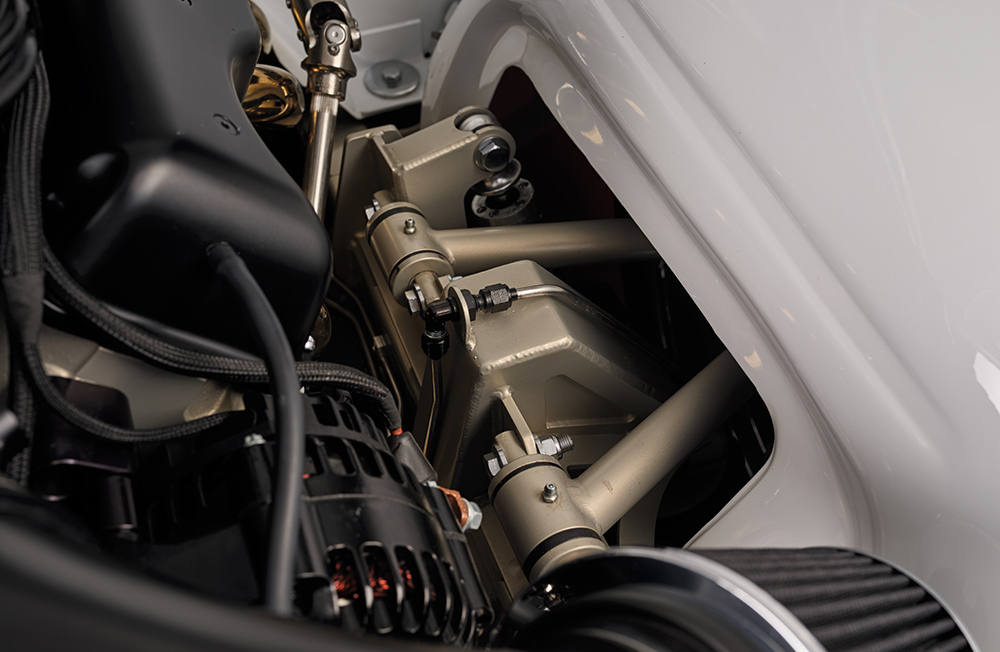 1959 Chevy Impala custom upper control arm and coilover suspension with clean body-colored engine bay