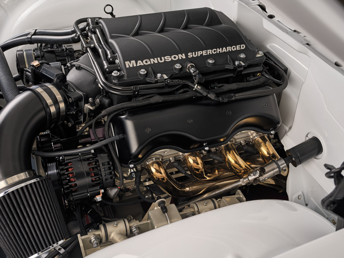 Magnuson supercharged LS motor with custom black intake and gold ceramic-coated headers in 1959 Impala