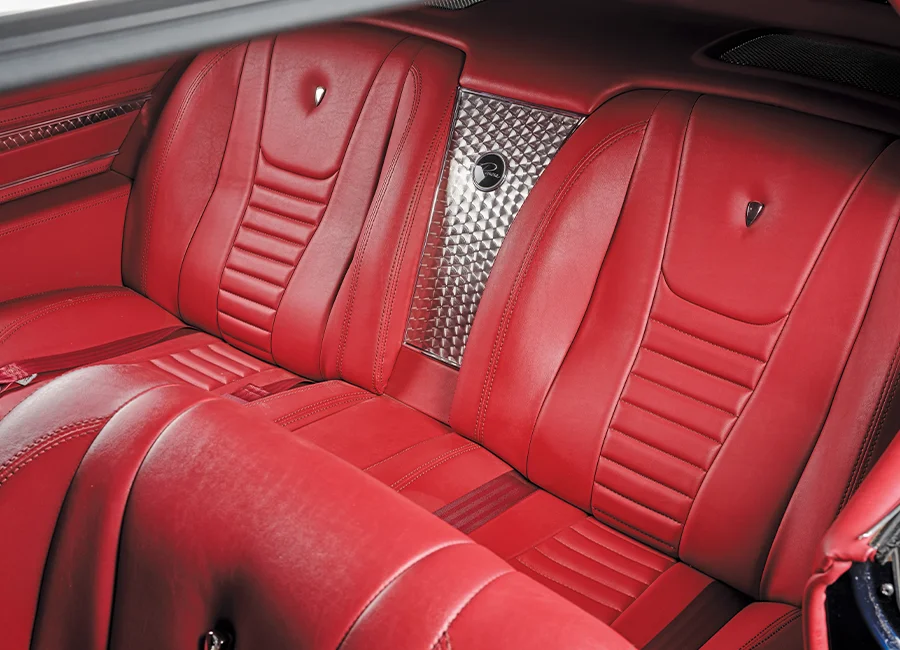Rear seat 1963 Buick Riviera, red stitched leather, custom bucket-style rear seating upgrade