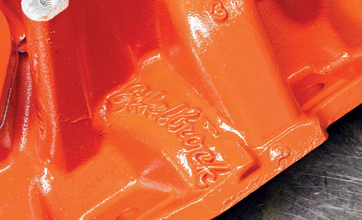 Edelbrock casting detail on high-rise intake manifold for Mopar 340 Six Pack engine