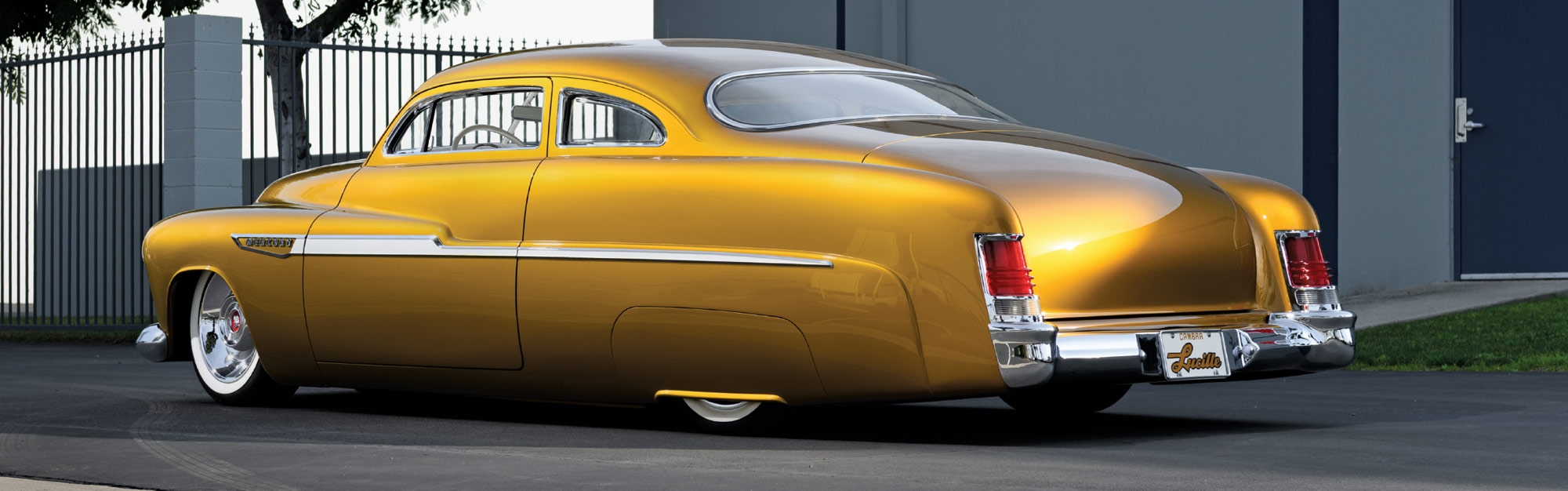 1951 Mercury Custom with shaved trim and integrated tail fins in sleek custom form