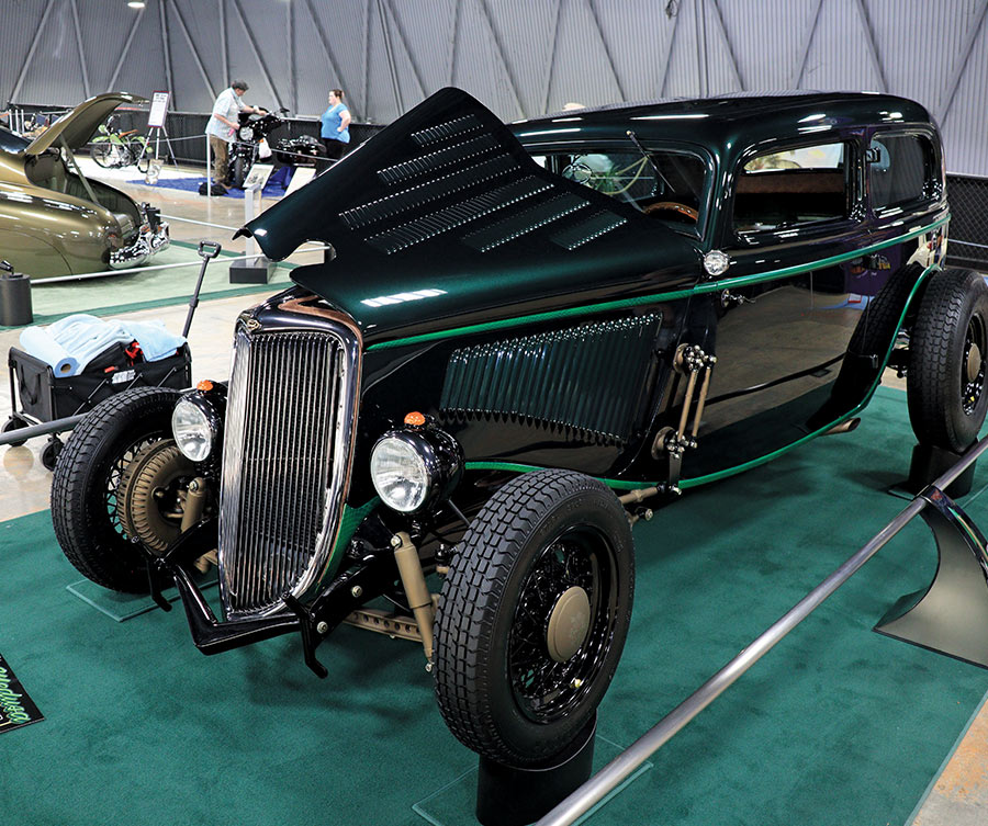 emerald green-colored 1934 Ford Tudor