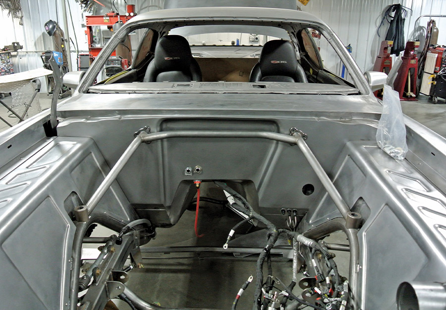 Weld-in firewall tubing reinforcement tied into roll cage and shock towers