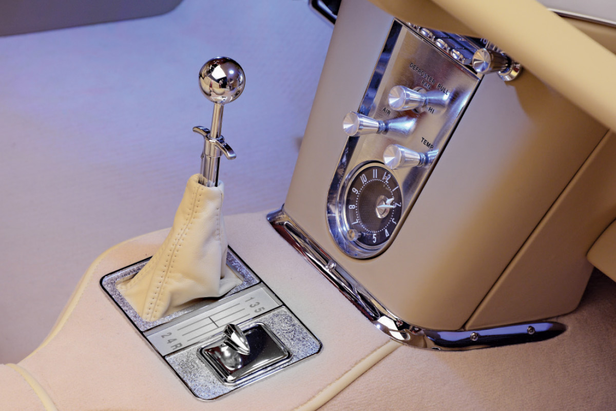 1962 Corvette center console includes a gated shifter and brushed aluminum HVAC panel