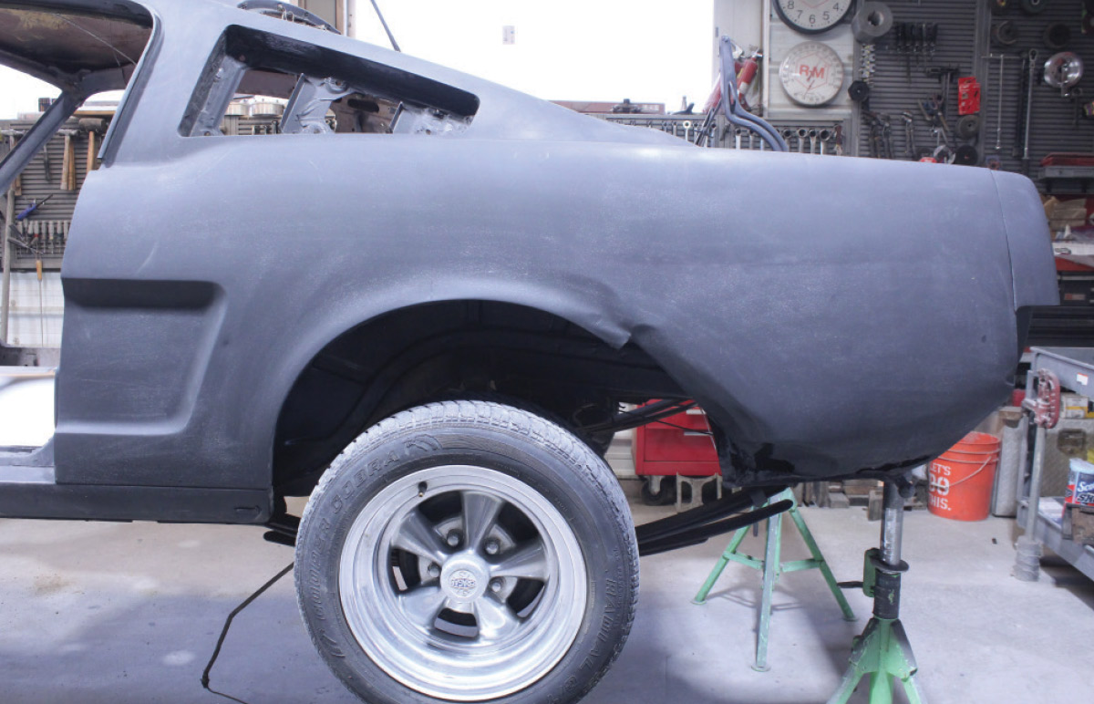 1965 Mustang new quarter panel test fit over wheel housing