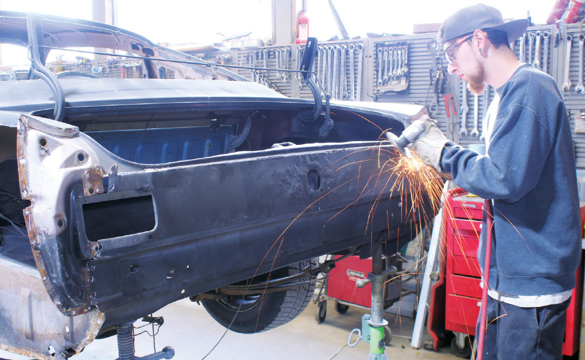 grinding welds on 1965 mustang tail panel for panel prep
