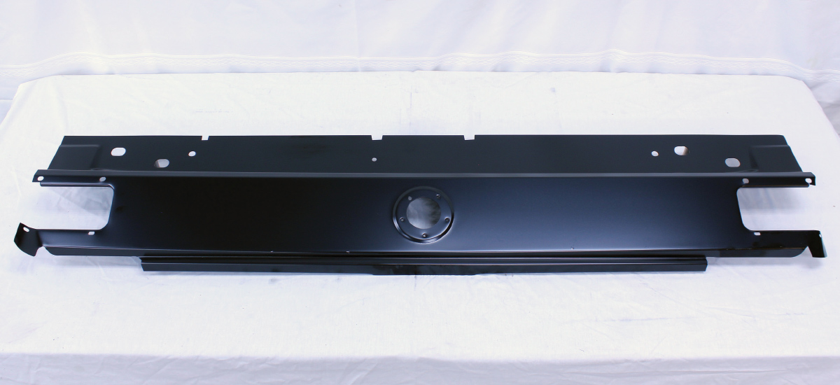 new 1965 mustang tail panel reproduction part on table