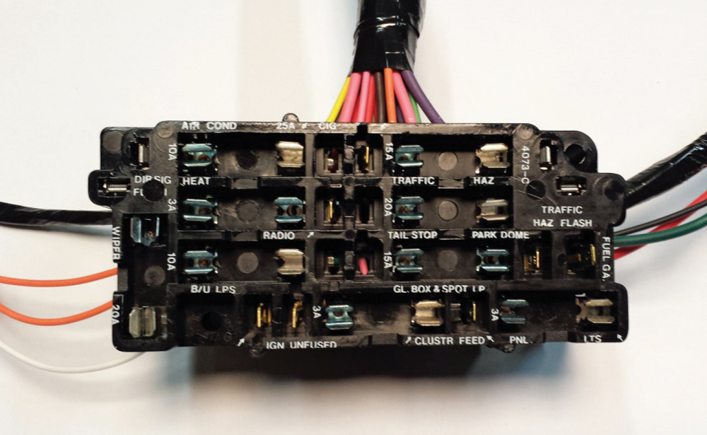 Original 1960 Dodge-style fuse block with glass fuses and printed circuit labels