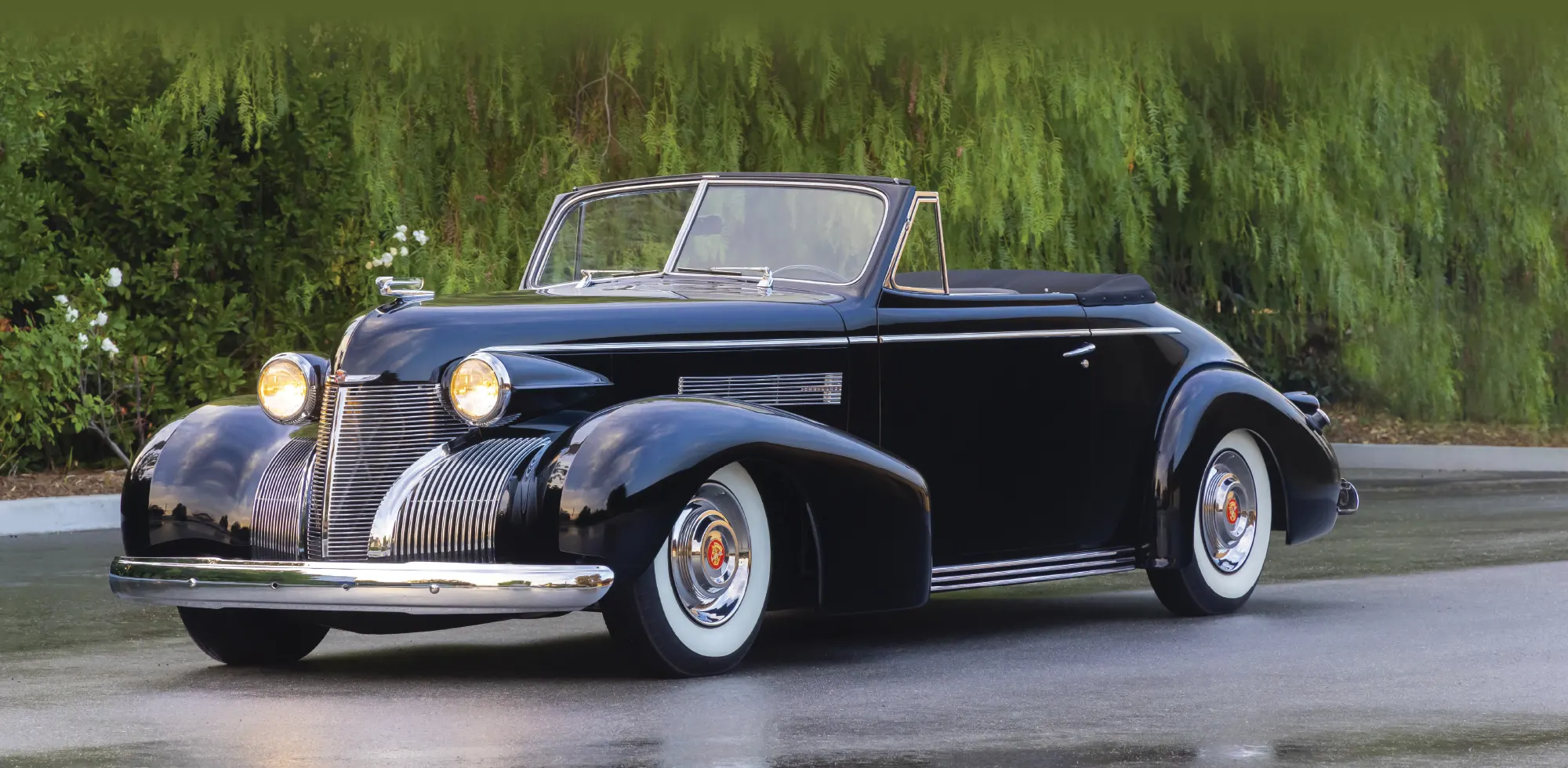1939 Cadillac Convertible front quarter view with dual headlamps and sweeping fenders