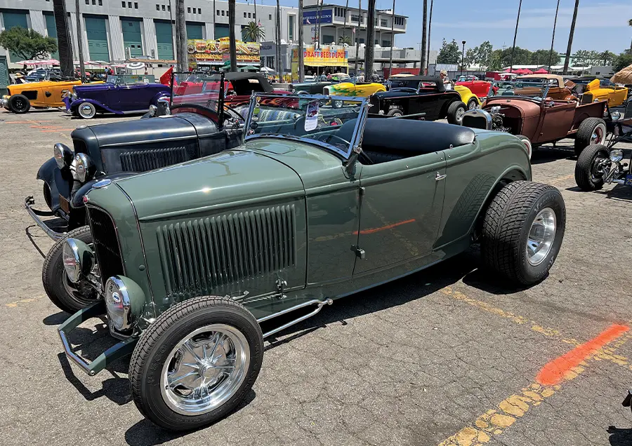 1932 Ford roadster in olive green with chrome five-spoke wheels
