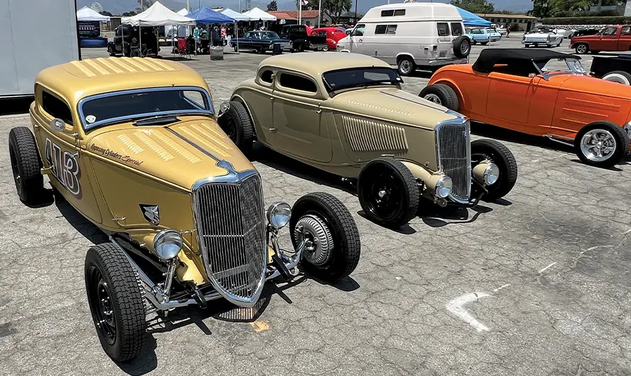 1933 Ford coupes in gold and tan with chopped tops and louvered hoods