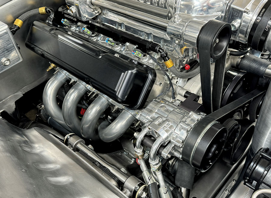 1969 Camaro polished headers serpentine belt AC compressor setup