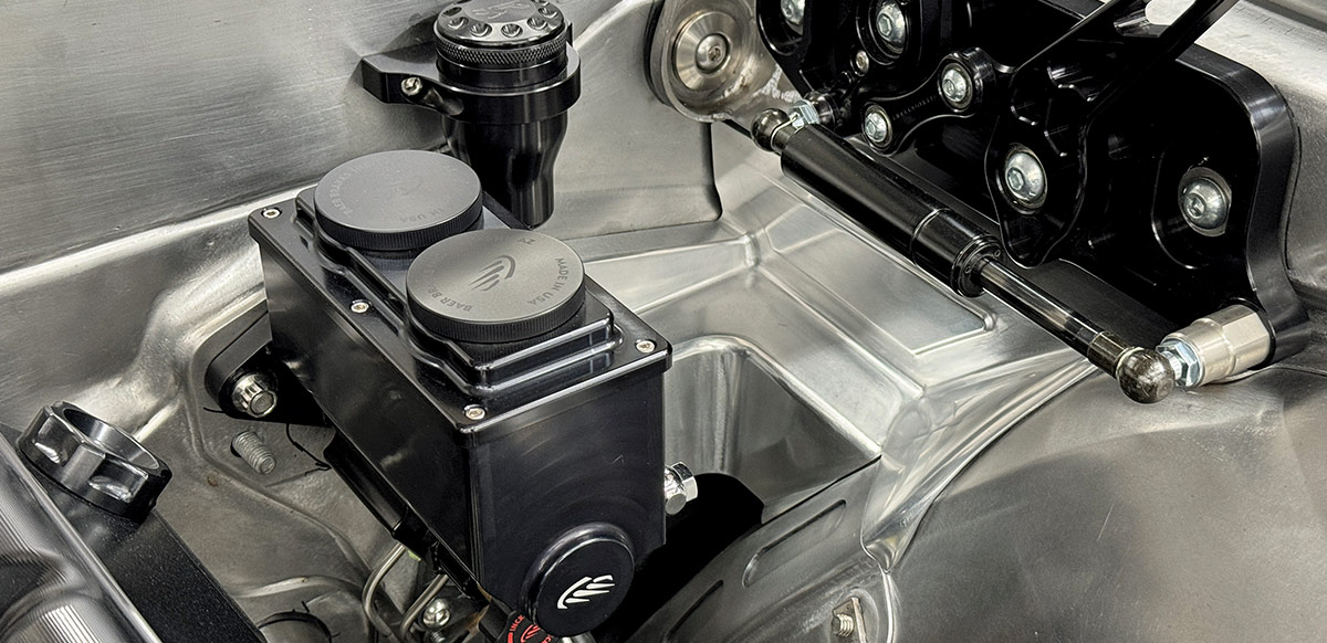 1969 Camaro master cylinder reservoir with billet linkage and anodized fittings