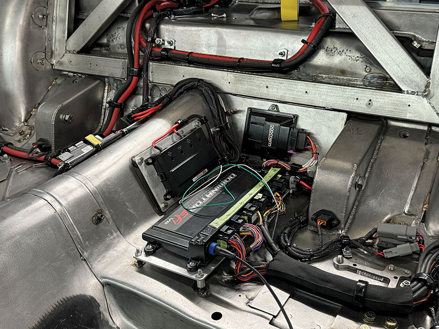 1969 Camaro rear seat area electronics with MoTeC and solid-state power distribution setup