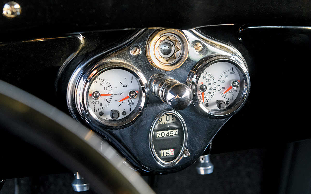 1929 Ford Tudor dash insert with white-faced Stewart-Warner gauges and chrome bezel