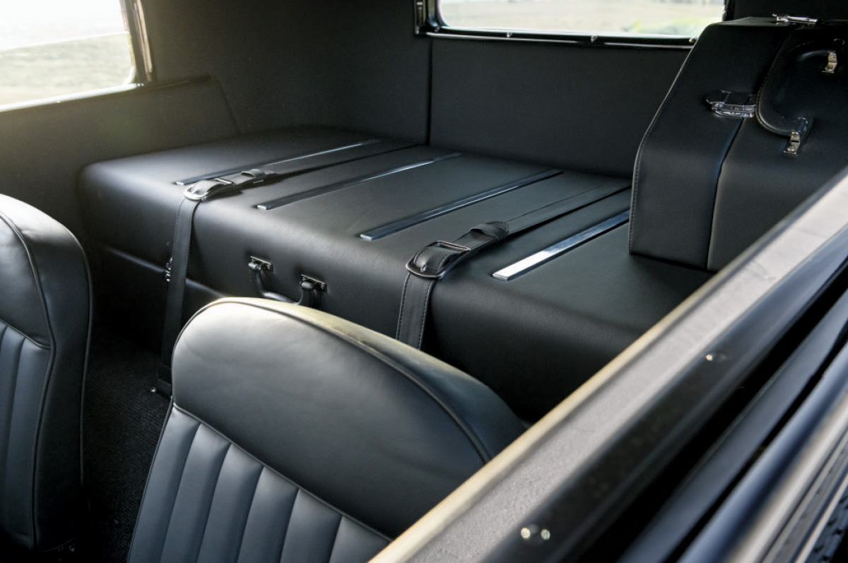 1929 Ford Tudor custom rear storage compartment with leather trim and hold-down straps
