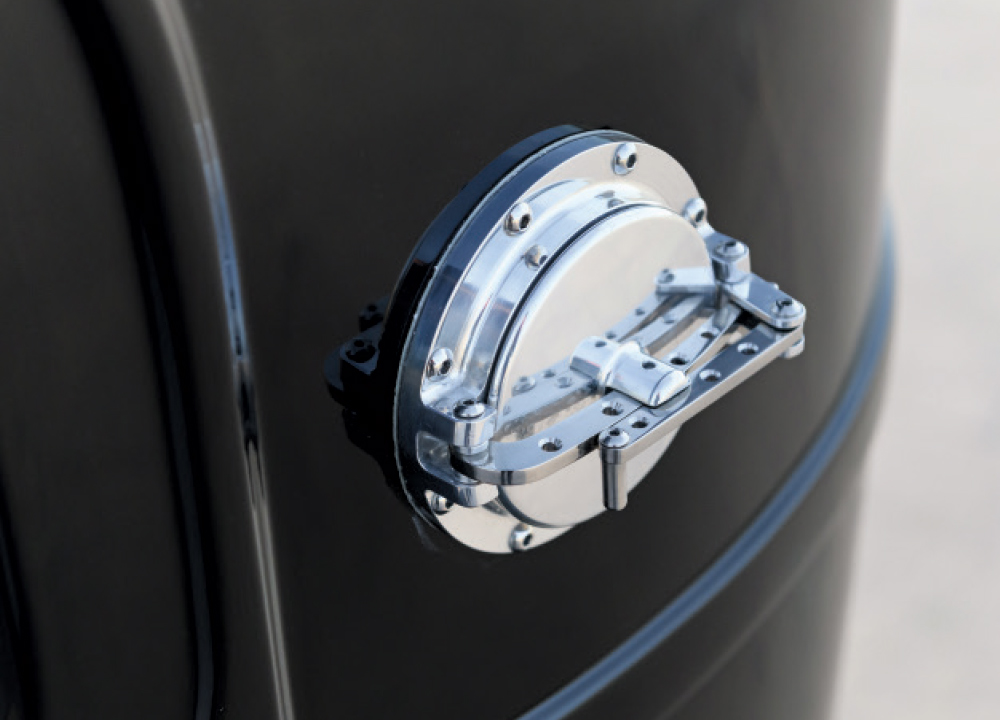 1929 Ford Tudor flush-mounted aircraft-style billet fuel filler on deep black paint
