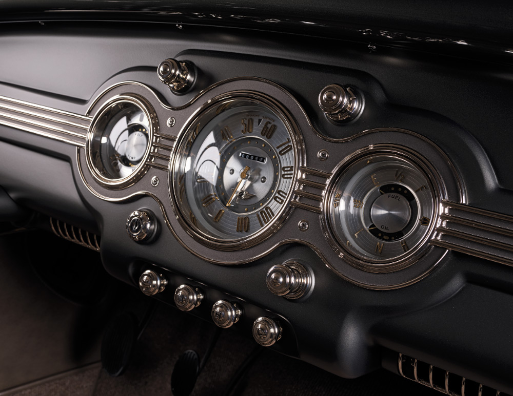 1936 Ford highboy passenger dash angle with integrated AC vents and art deco gauge panel
