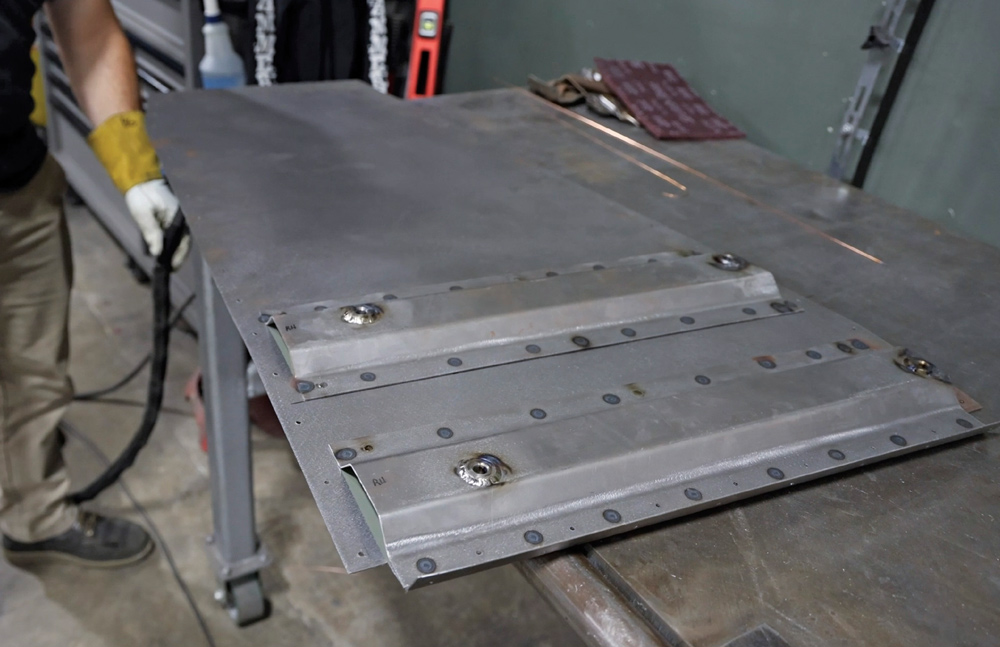 1962 Chevy convertible bead-rolled sheetmetal floor pan with riveted stiffeners