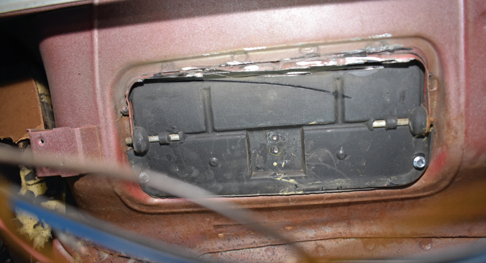 cowl vent door interior view metal flap linkage maroon dash panel