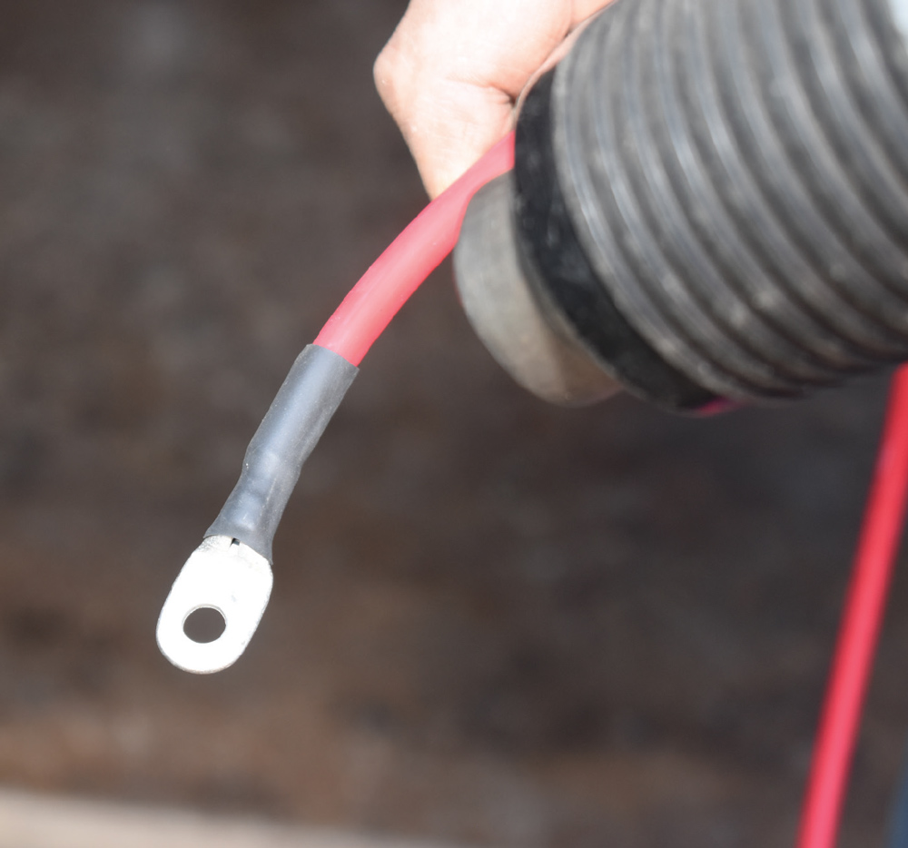 crimped battery cable red wire heat shrink ring terminal finished end