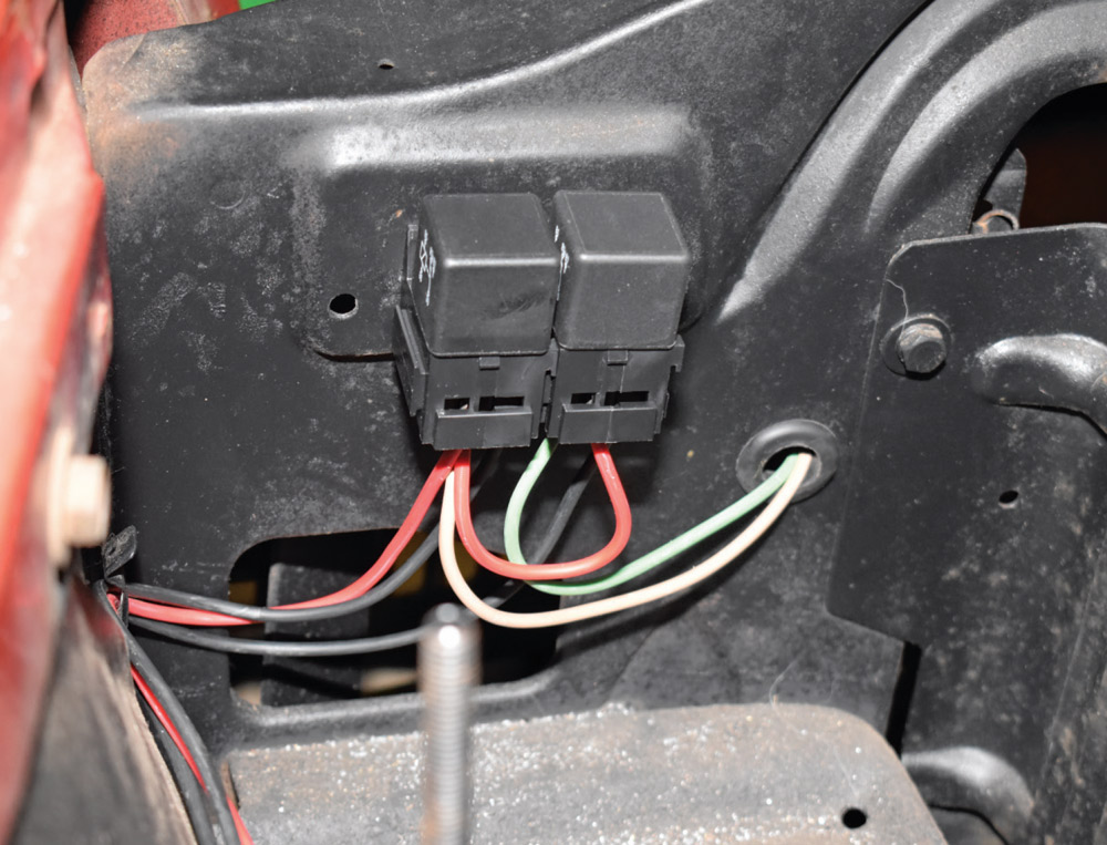 mounted relays on inner fender wiring harness routed with firewall grommet