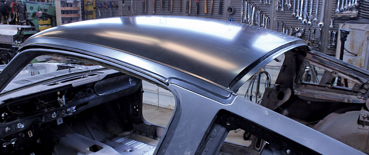 New black EDP-coated roof skin test-fitted on 1965 Mustang Fastback body