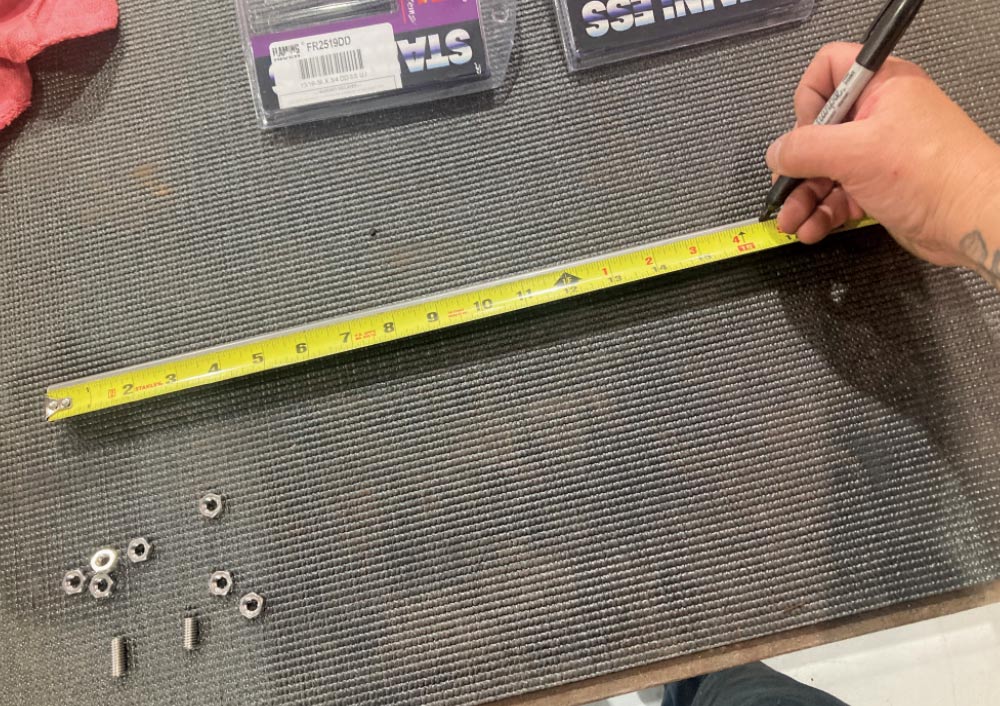 1964 Pontiac GTO measuring double-D shaft cut length at 15.25 inches for custom intermediate section