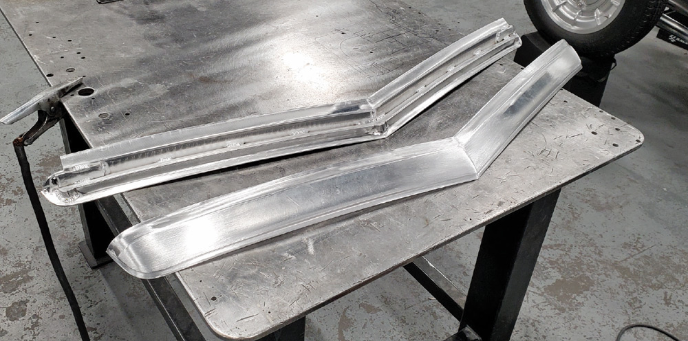 1936 Ford Roadster hand-formed windshield frame aluminum shaping traditional coachbuilt fabrication