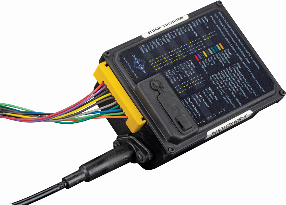 Dakota Digital control module, warranty seal, multi-colored wiring harness