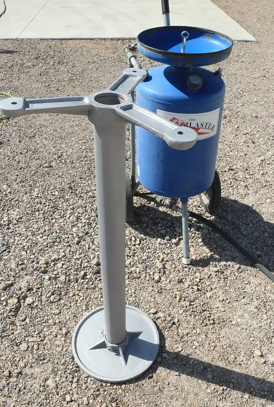 Sandblasted metal stand primed and ready for surface treatment
