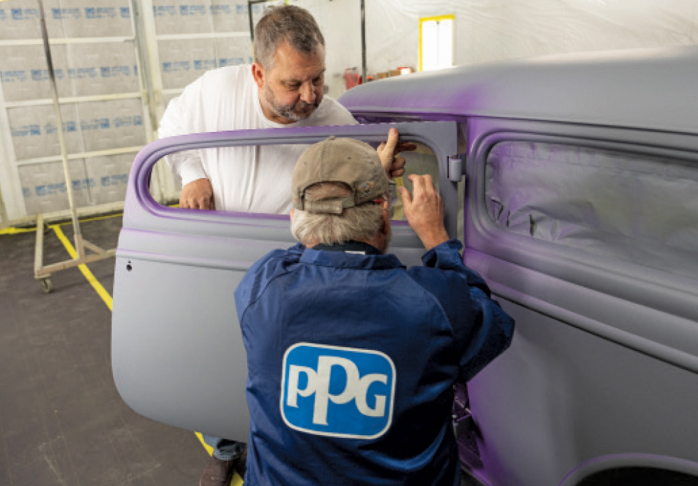 Close-up of metallic purple flake finish on 1930s Ford coupe body