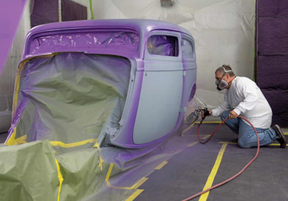 1930s Ford coupe door with fresh metallic purple flake paint, drying process