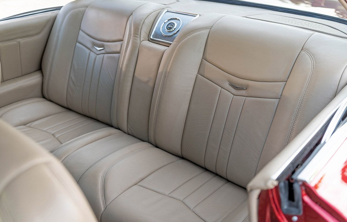 1962 Chevy Impala rear bench seat full leather wrap Cadillac-style stitching and speaker grille trim