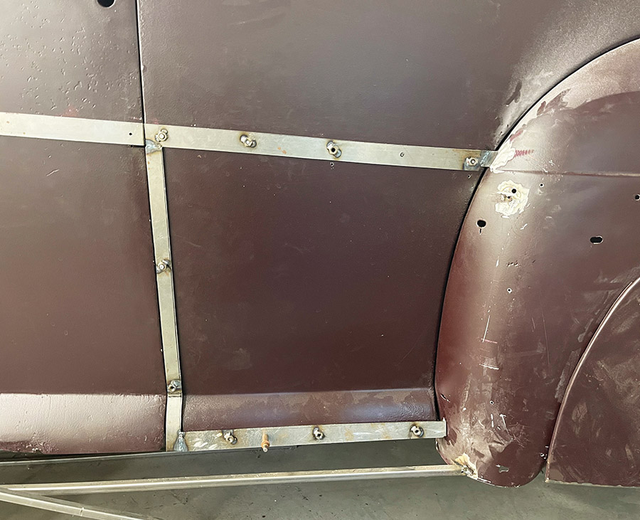 1947 Ford coupe, close-up, welded support strips for custom fadeaway fender metalwork