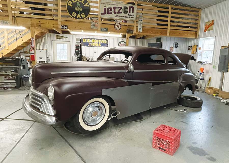 1947 Ford coupe, front angle, custom fadeaway fender metalwork, grille and wheel detail